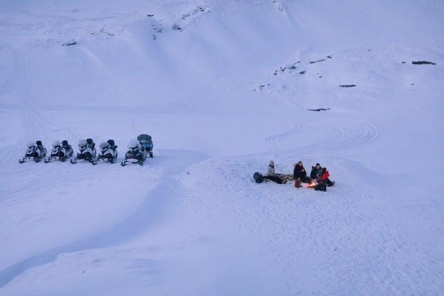 Abisko: Great Outback Snowmobile Tour with Lake Abiskojaure - Getting kitted up in Abisko: the part that makes cold weather easier
