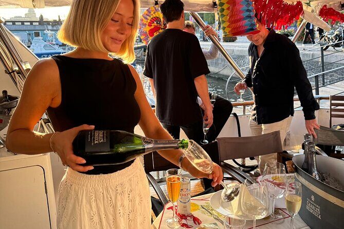 Exclusive Yacht Tour of Stockholm: sunset, dinner, lunch, cruise - Blasieholmen waterfront cruise: Grand Hotel, Nationalmuseum, and modern design nearby