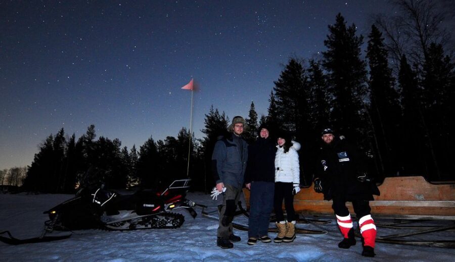 Luleå : Northern Lights Tour on a Snowmobile drawn Sled - The Sled Ride Setup: Warm, Seated, and Pulled Across the Frozen Sea