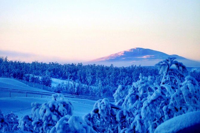 Snowmobile Safari to Lapland viewpoint - Frozen-lake coffee, Swedish Fika, and trying ice fishing