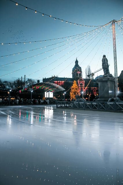 Stockholm: Christmas Markets & Lights Guided Walking Tour - Swedish Christmas traditions: tomten, Dalécarlie horse, and Lucia