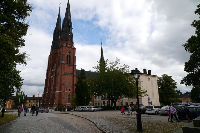 Uppsala's biggest attractions - 1h city walk in Uppsala city. - Stop 1: Uppsala University Main Building, Decorations, and Rune Stones